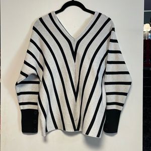 NEW.  Black and White Sweater.  Size Medium
